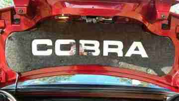 Click On Picture to Enlarge . 1999-2004 Ford Mustang Cobra. Sunk Plexi Mirror "COBRA" Letters.